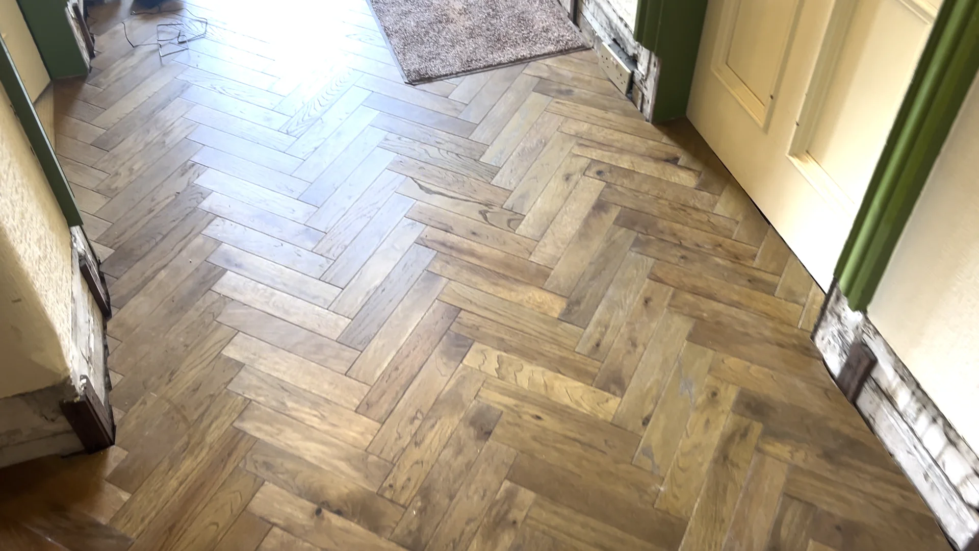 Herringbone oak flooring fitted in a period Glasgow hallway